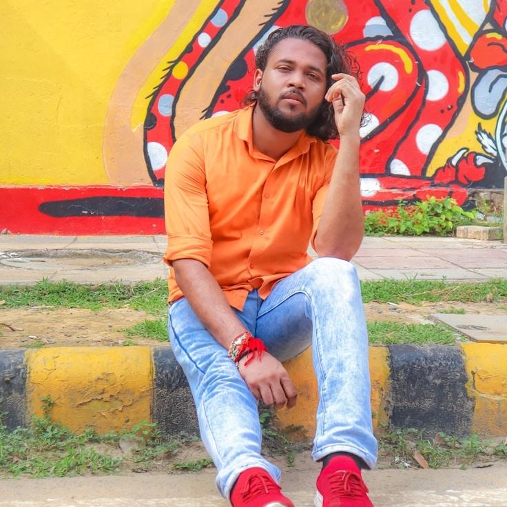 Alex Carter, Lead Design Curator at Urban Field Labs, reviewing corporate floral arrangements